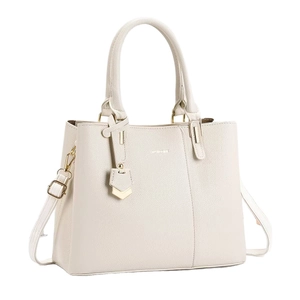 Elegant off-white lychee leather handbag with golden hardware and adjustable strap