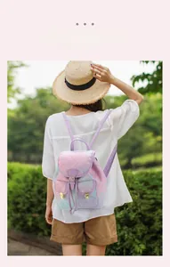 Detail of gradient floral backpack with drawstring closure and metal magnetic buckle