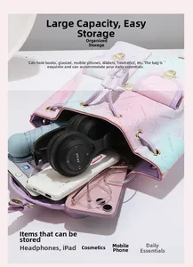 Detail view of pink and blue floral backpack showing large storage capacity for gadgets