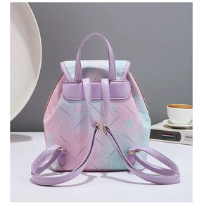 Close-up of floral print and purple gradient texture on this mini PU leather backpack