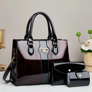 3-piece women's tote set in burgundy snakeskin embossed patent leather with gold hardware