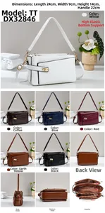 Detail view of multi-compartment crocodile pattern handbag with dimensions 24x9x14cm
