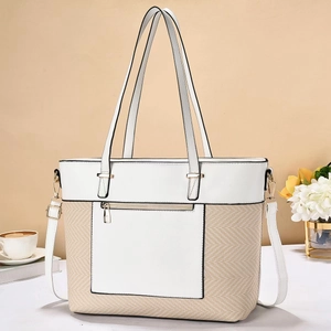 Chic two-tone white leather and straw tote bag for women featuring long shoulder straps