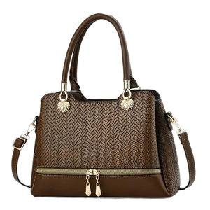 Dark brown women bag with woven texture and gold shell metal hardware accents