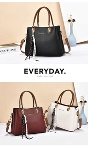 Chic pebbled leather tote bags in black and burgundy with elegant silk scarf and gold hardware