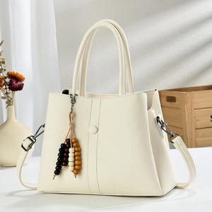 Elegant cream white lychee texture tote bag with vintage wooden bead charm and strap