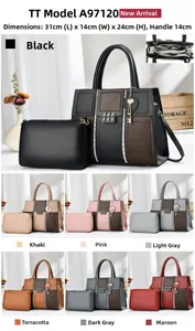 Detail view of mini square handbag showing metal buckle, key charm, and multi-compartment interior