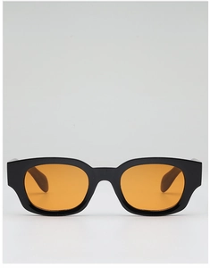 Détail de lunettes de soleil vintage à monture noire épaisse et verres teintés orange