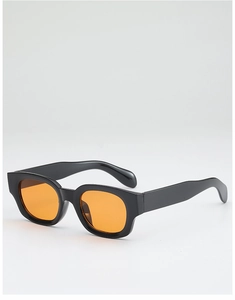 Vue détaillée de lunettes de soleil en acétate noir avec verres teintés orange