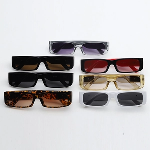 Flat lay of retro rectangle sunglasses in seven assorted colors and frame textures