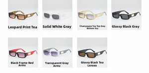 Detailed view of narrow rectangular sunglasses in seven colors with gold temple accents