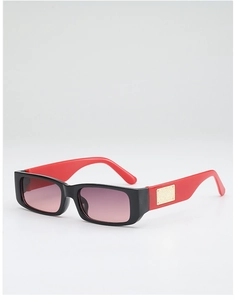 Macro view of rectangle sunglasses showing red temples and gold texture decor