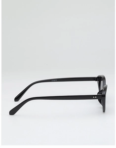 Detail view of glossy cat eye sunglasses featuring silver dot accents and CY5616 model ID