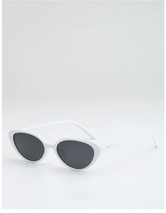 Detailed view of white cat-eye sunglasses with silver rivet accents and dark lenses