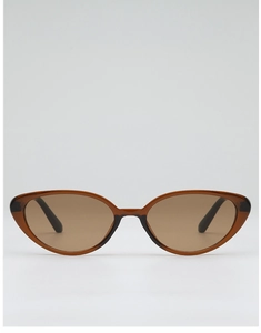Front view of retro cat-eye sunglasses with translucent brown frames and dark lenses