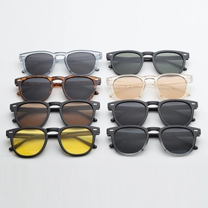 Macro display showing retro round sunglasses in various colors and tinted lenses