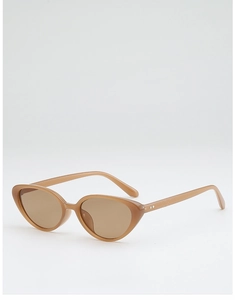 Detail view of brown cat eye sunglasses featuring elegant metal rivets and resin frame