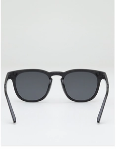 Detail view of the sleek black full-rim frame and inner temple of fashion sunglasses