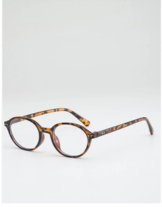 Détail de lunettes de soleil rondes en écaille avec rivets argentés et verres teintés