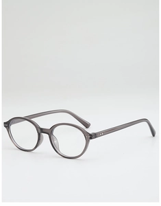 Vue détaillée de lunettes de soleil rondes gris transparent avec rivets rétro en métal