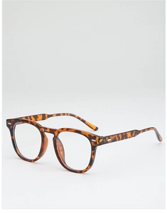 Detail of vintage tortoise shell sunglasses frame with silver metal rivets accents