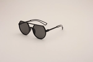 Detail view of black kids sunglasses featuring a double bridge and irregular frame design