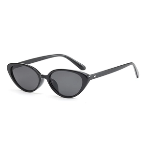 Classic black cat-eye sunglasses with decorative silver studs shown in a 45-degree angle