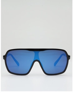Close-up of black oversized frame sunglasses with blue reflective mirrored lenses