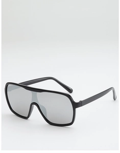 Detailed close-up of glossy black oversized frame sunglasses with silver mirrored lenses