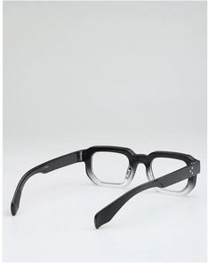 Detail view of square black to transparent gradient glasses frame with rivet accents
