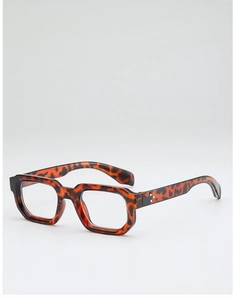 Close-up of retro tortoiseshell thick frame glasses with metal rivets and square edges