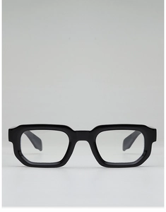 Detail shot of black rectangular full-rim glasses with a polished glossy finish