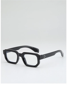 Detail of retro square black frames with iconic silver rivet accents on the side