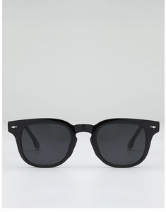 Detail of black square sunglasses featuring silver diamond-shaped metal rivets on frame