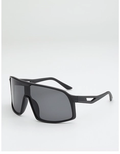 Detail view of black matte cycling shield sunglasses with geometric temple cutouts
