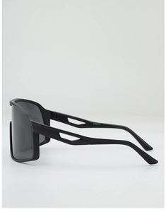 Side view of oversized black matte cycling sunglasses with stylish hollowed-out temples