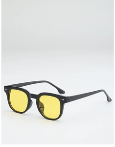Detail of retro square sunglasses with black frame, yellow lenses and silver arrow accents
