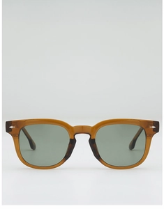 Close-up of translucent amber square frame sunglasses with metal diamond rivet details