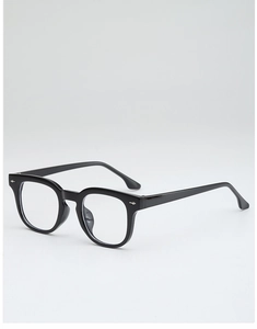 Close-up of classic black square frame sunglasses with transparent lenses and retro design