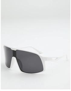 Detail of white cycling sunglasses with oversized grey lens and hollow temples design