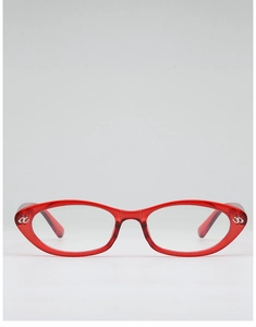 Detail view of transparent red cat eye frames with silver metal letter logo accents