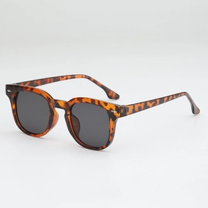 Classic tortoise shell square sunglasses with retro frames and dark gray UV lenses