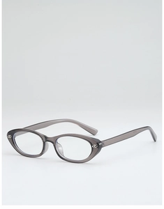 Detailed view of grey transparent cat-eye frames with silver metal letter hinge accent