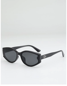 Macro shot of stylish black cat eye sunglasses featuring silver metal temple accents