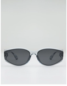 Front view of cat eye sunglasses with light blue resin frames and dark gray lenses