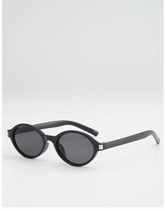 Detail view of retro square sunglasses with silver metal accents on black frames