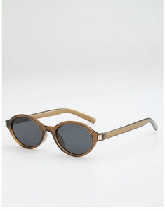 Macro view of vintage oval sunglasses featuring amber frames and dark grey lenses