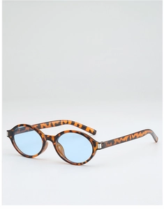 Macro detail of retro leopard print square sunglasses with tinted blue lenses