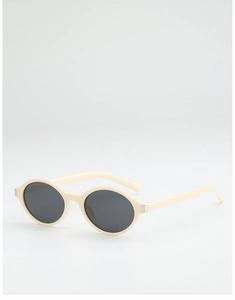 Detail view of cream-white oval sunglasses featuring silver metal hinge accents