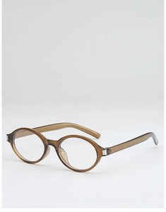 Detail of vintage round translucent amber frames with elegant metal hinge accents